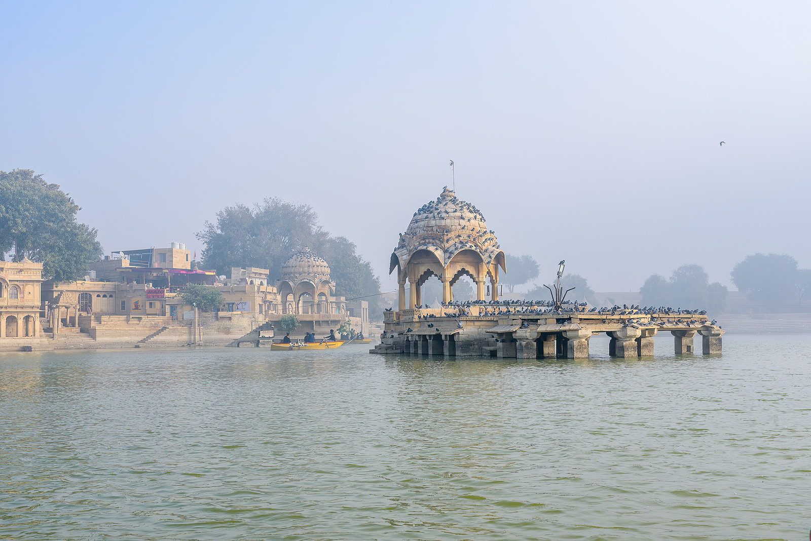 Pavilion in Gadisar Lake in the early morning haze