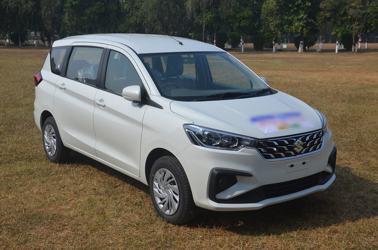 White Maruti Ertiga seven seat vehicle for Rajasthan tours
