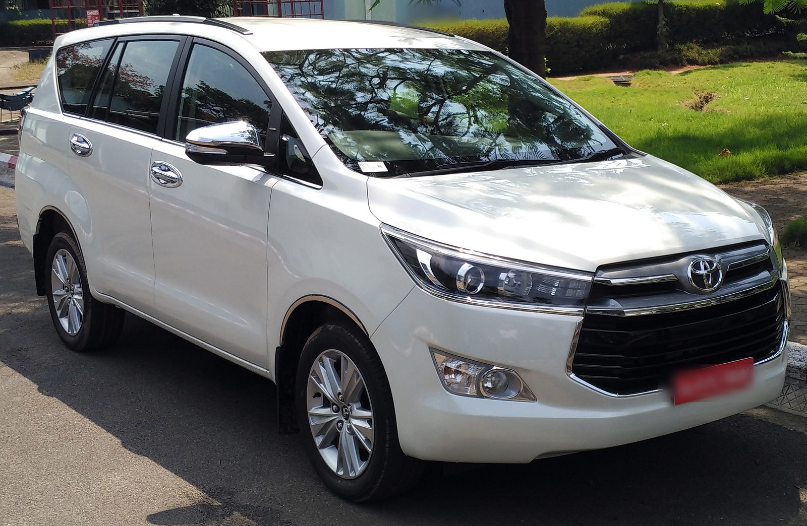 White Toyota Innova Crysta used for private Rajasthan tours
